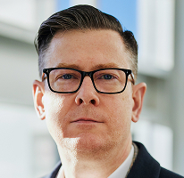 Alexander Hughes, PDG et dirigeant d'une société de trading crypto, portrait
